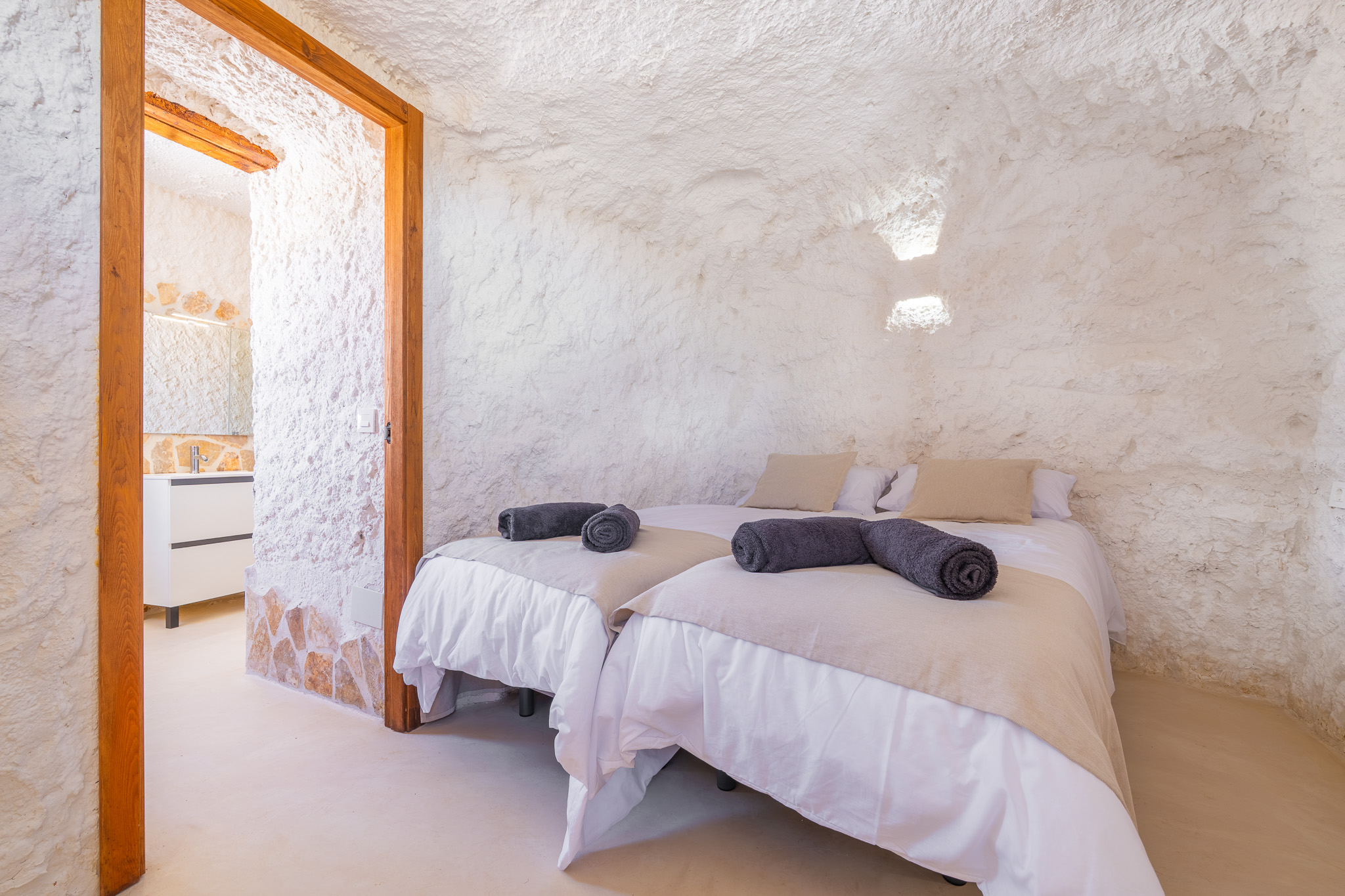 Quiet cave bedroom at Cueva Alba