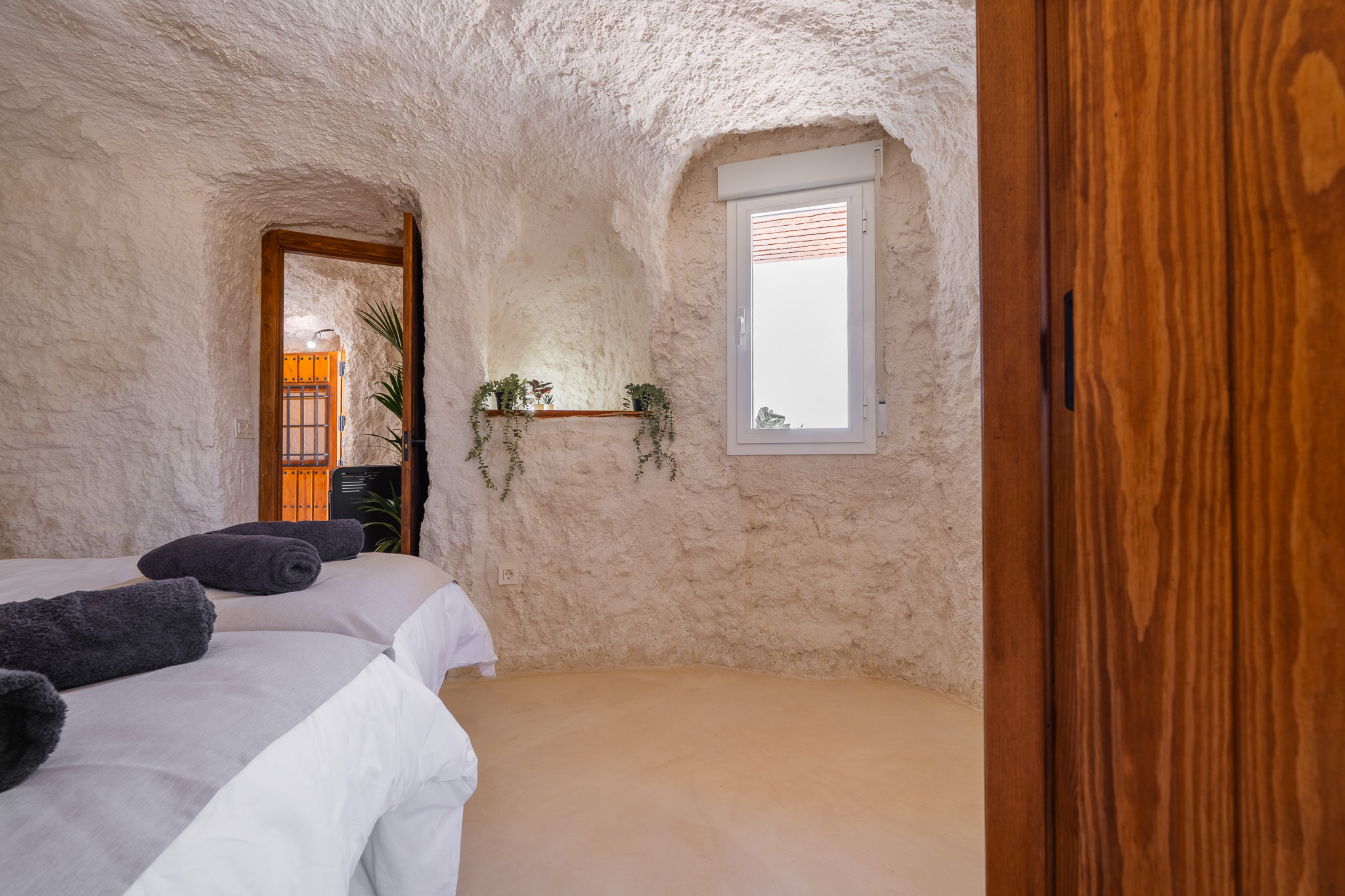 Bedroom with warm timber details