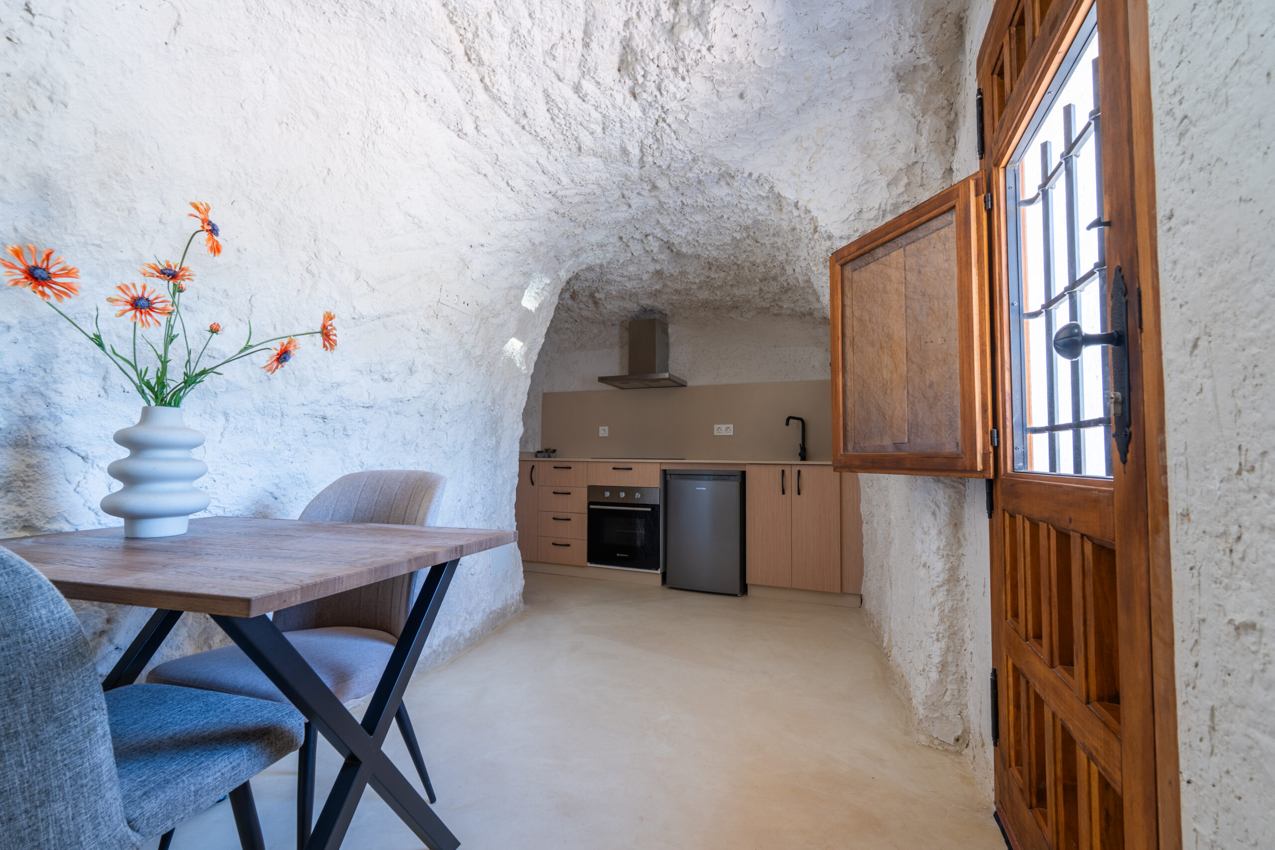 Kitchen and dining area inside Cueva Alba